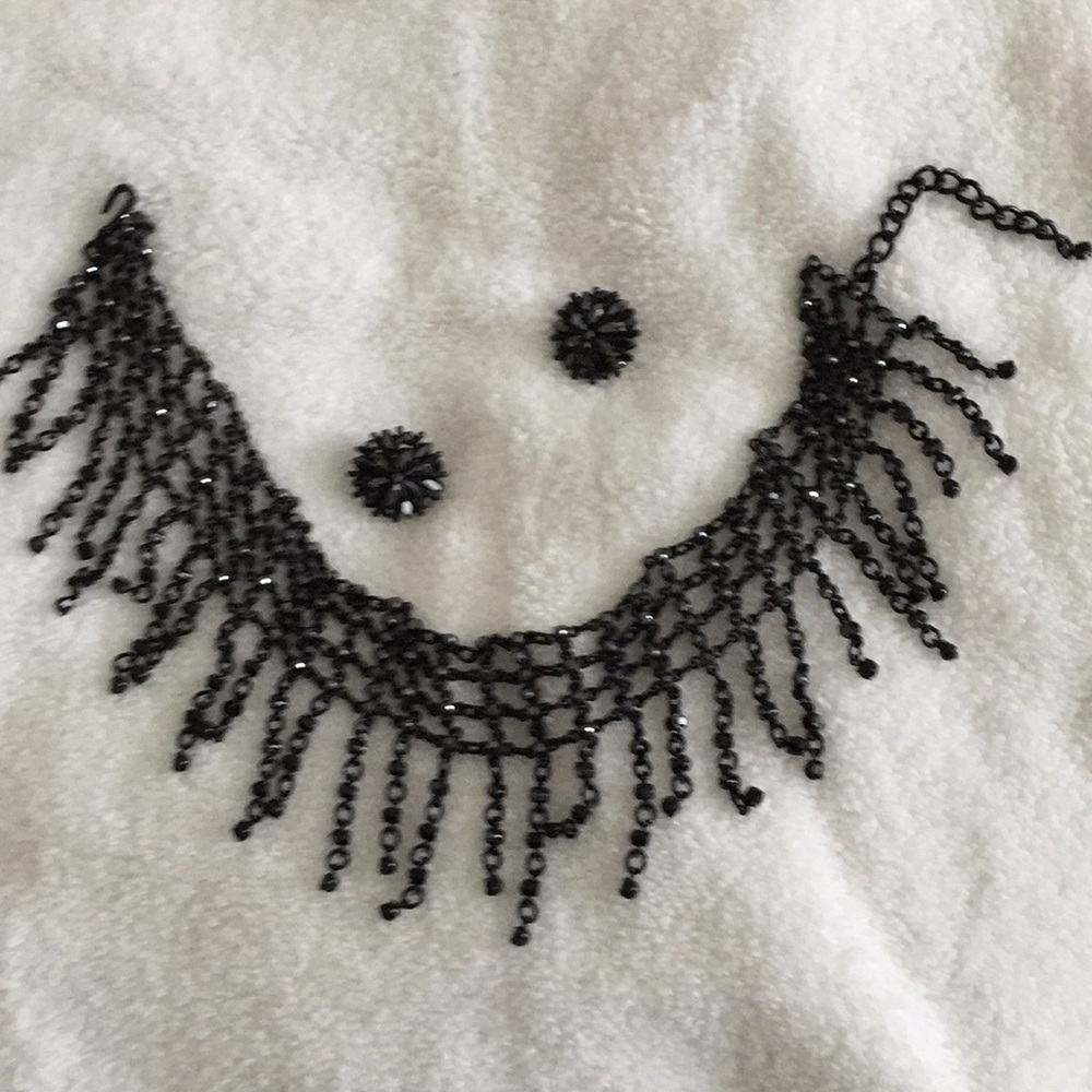 Choker with matching earrings.